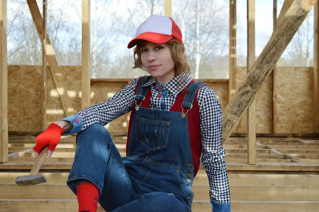 a hammer, tools, young woman, builder, workers, building, repair, tool, work, build, equipment, construction, handyman. Women in trades: UK training grants and loan routes
