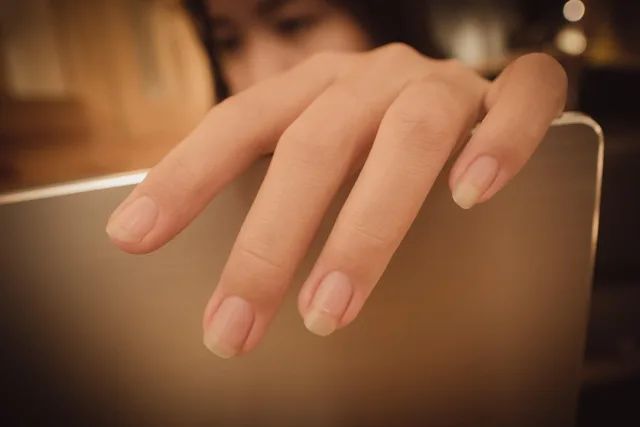 hand, laptop, girl, fingers, young woman, woman, closeup. Women founder funding: grants, loans, debt, equity, support